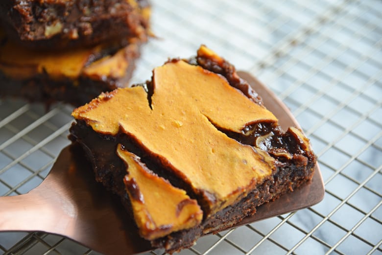 Pumpkin brownies on a spatula 