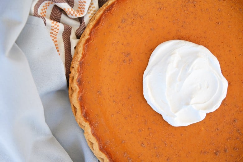 Delicious pumpkin pie on jewel toned linens 