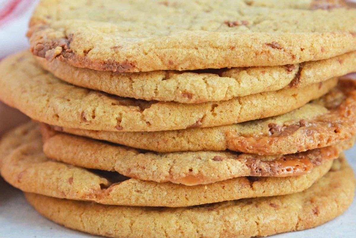 Close up of stack of cookies with caramel and chocolate 