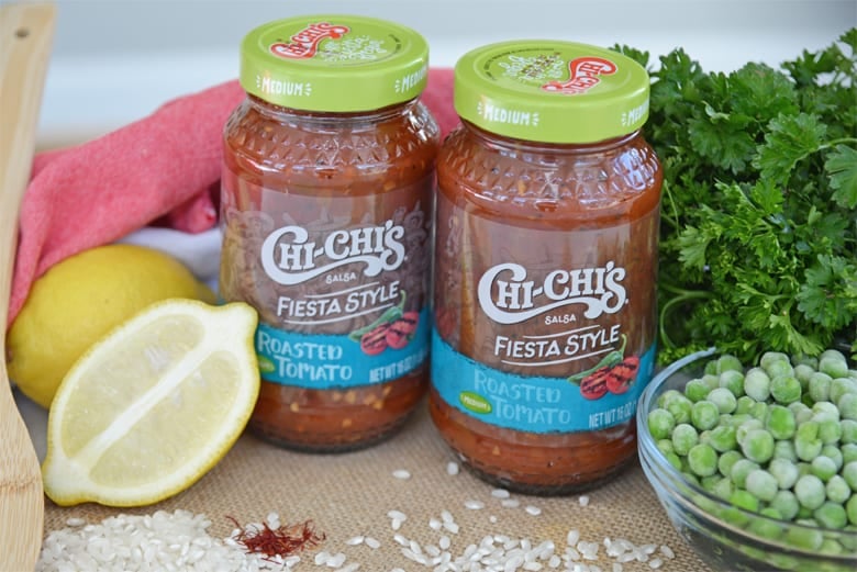 CHI CHI'S Fiesta Style Fire Roasted Tomato Salsa bottles with lemons, parsley and frozen peas 