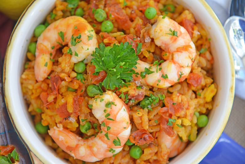 Close up of a bowl of shrimp paella 