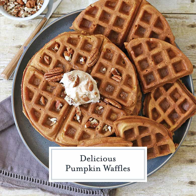 Overhead of pumpkin waffles with honey cinnamon butter and walnuts 