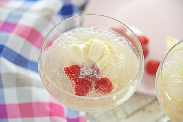 champagne float with raspberries 