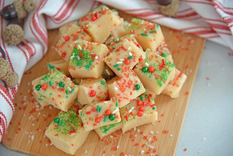 Pile of Christmas fudge on a wood cutting board 