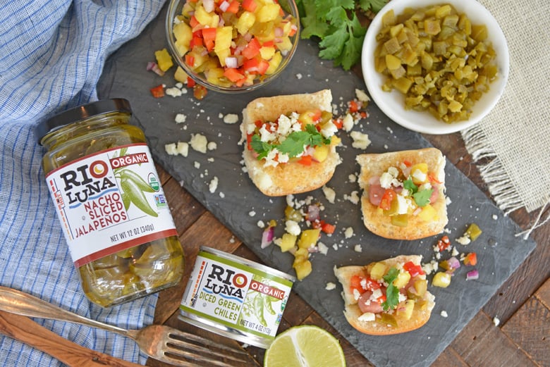 Pineapple salsa on hot dog sliders with Rio Luna Peppers