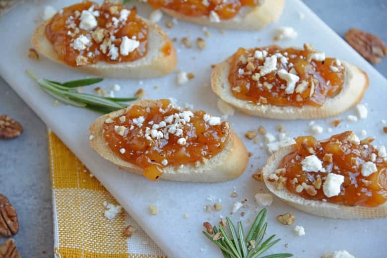 pear and apricot crostini on a serving platter 