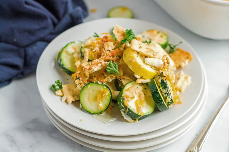 Cheesy squash casserole on a plate 