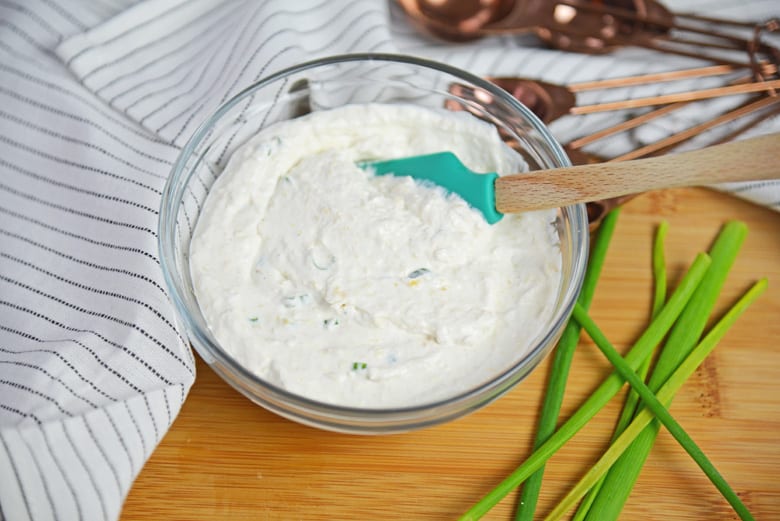 Creamy horseradish sauce in a small mixing bowl 