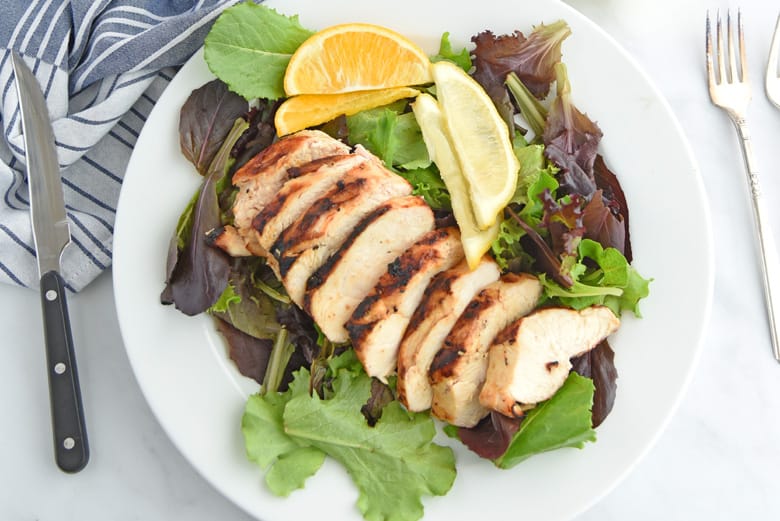 Grilled sliced chicken on a salad 