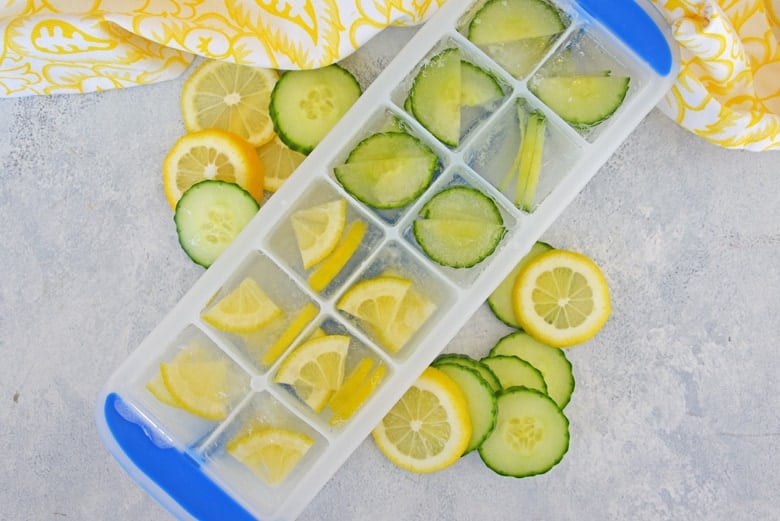 Lemons and cucumber in an ice cream tray 