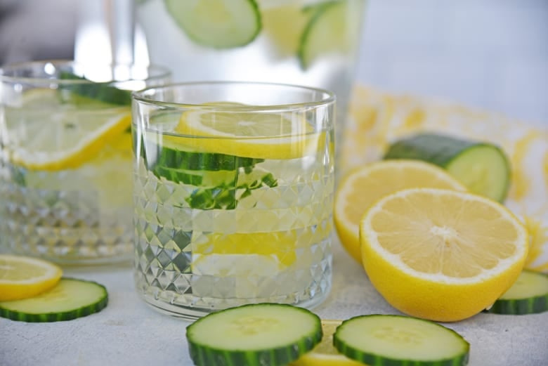 Lemon cucumber water in a short glass 
