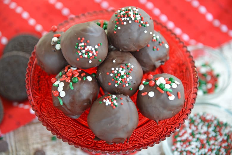 Oreo cookie balls on a red serving platter 