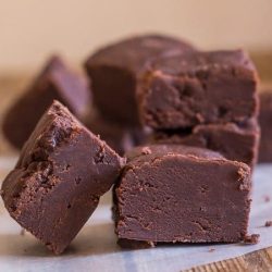 Close up of chocolate fudge on parchment paper