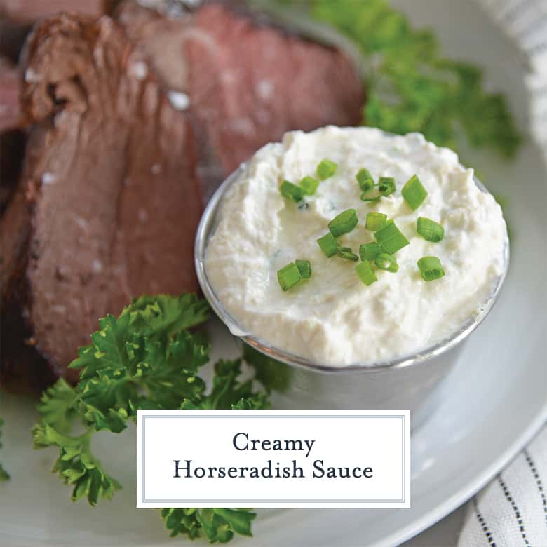 Creamy horseradish sauce in a silver cup 