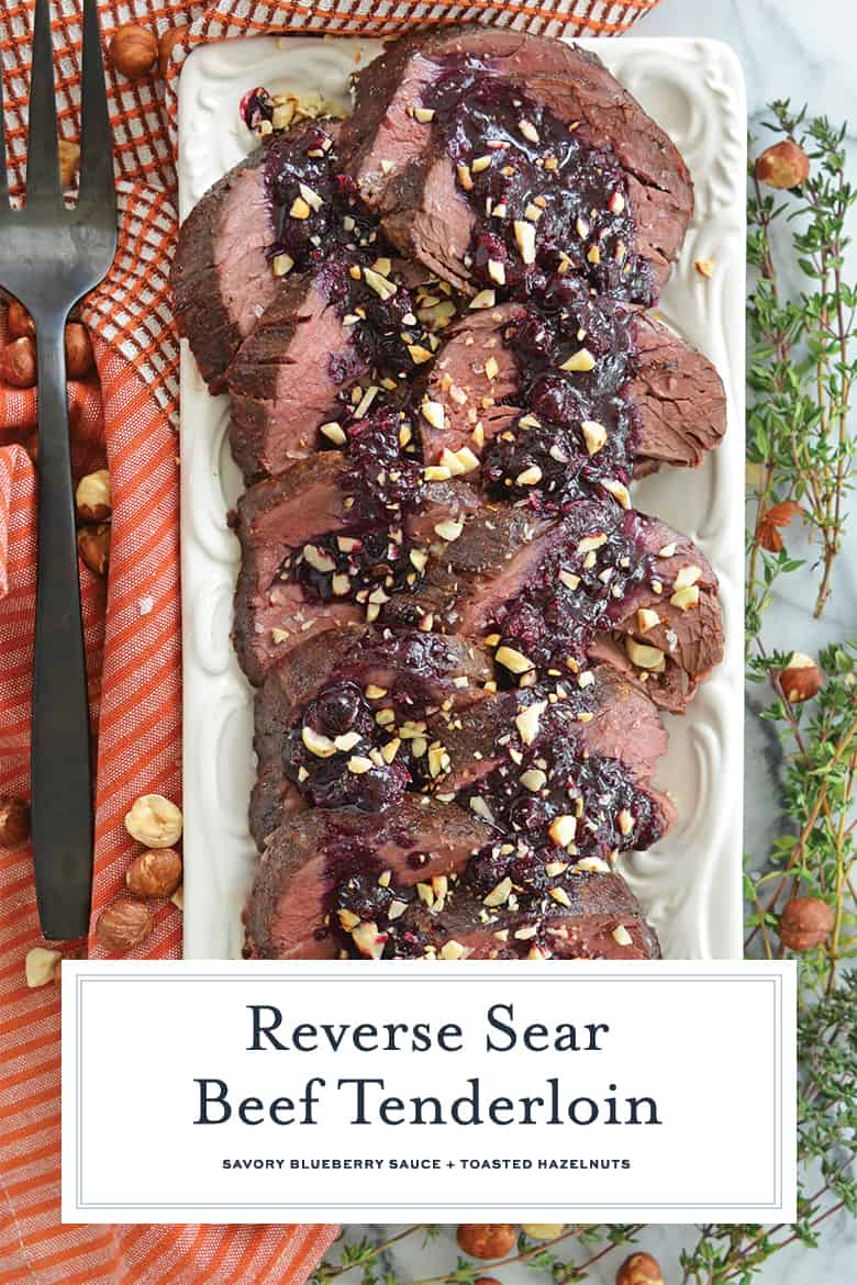 Overhead of beef tenderloin sliced on a serving platter 