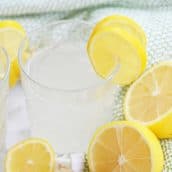 A glass of lemon detox water