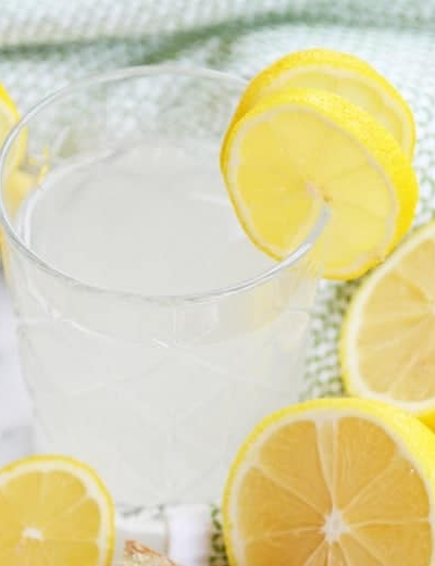 A glass of lemon detox water