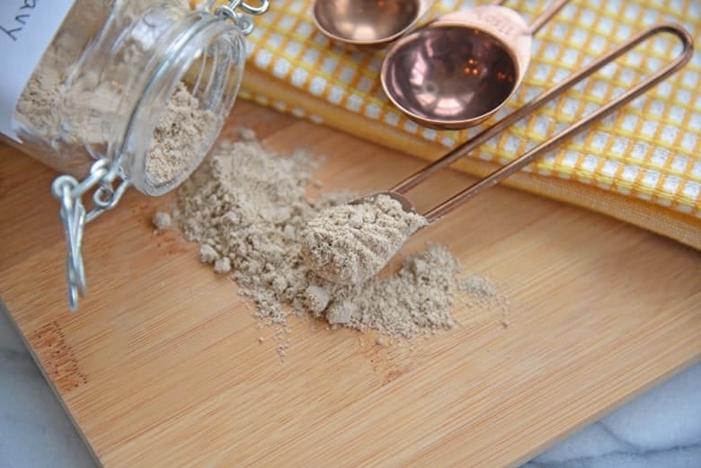 Dry brown gravy mix on a cutting board 