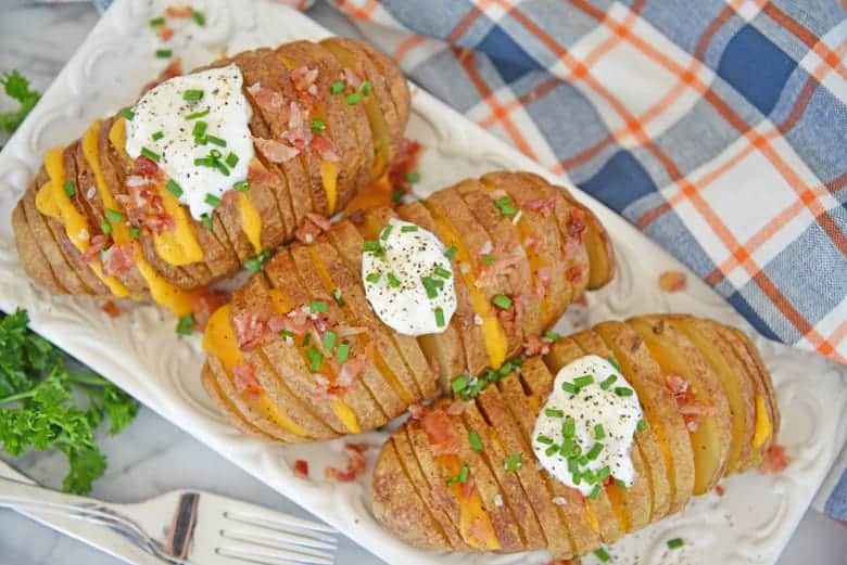 Serving platter of baked potatoes 