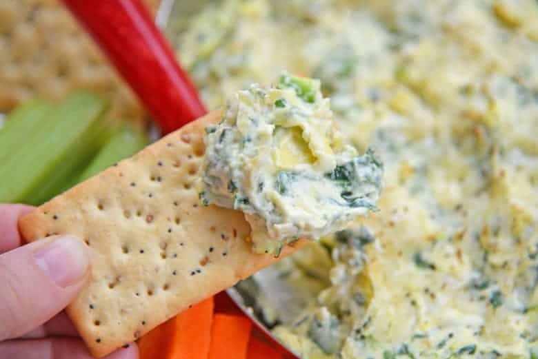 Spinach dip on a cracker 