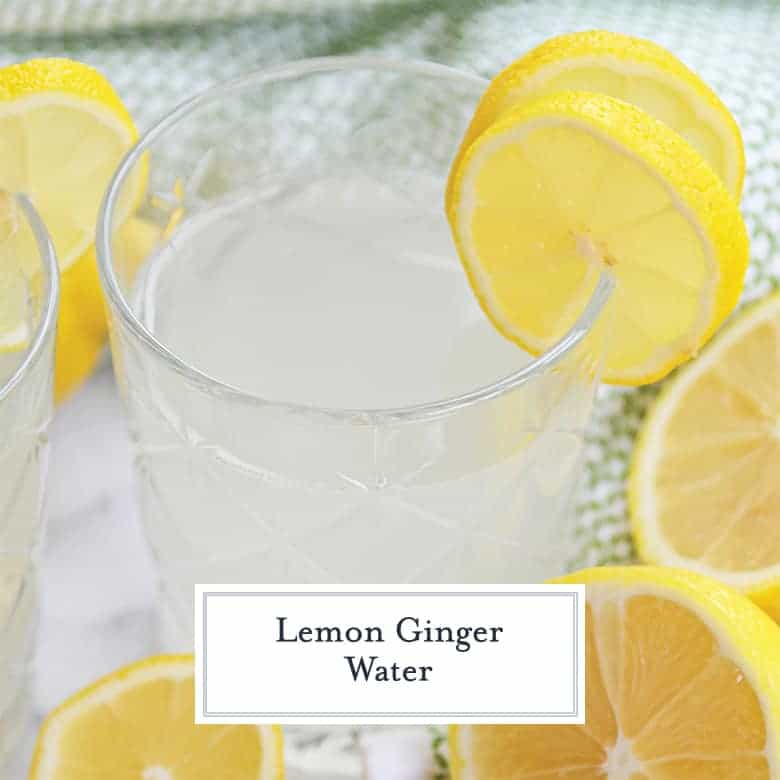 Close up of lemon ginger water with lemon slices 