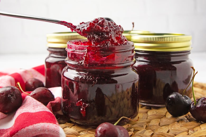 homemade cherry jam in mason jars