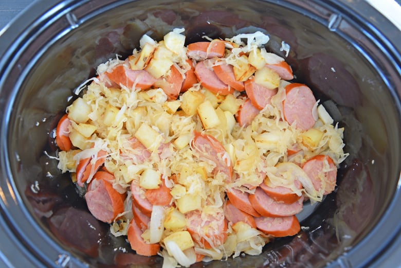 Finished kielbasa and kraut in a slow cooker 