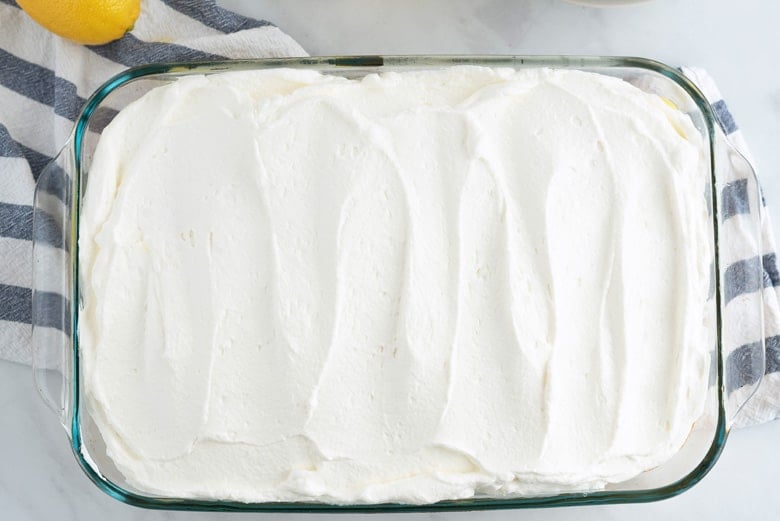 Frosted lemon poke cake 