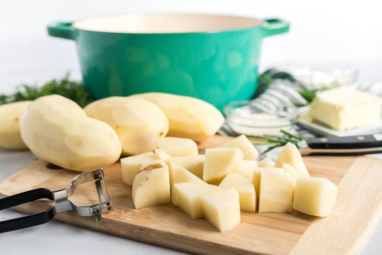 chopped potatoes and ingredients for  ranch mashed potatoes 
