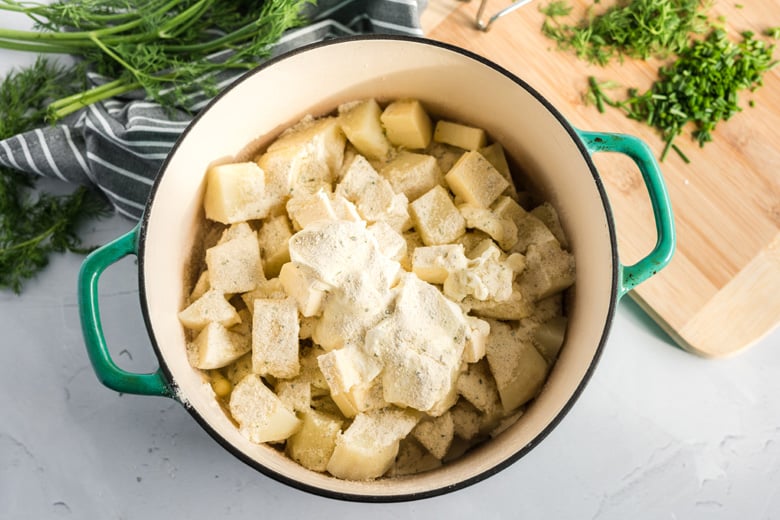 chopped potatoes and ranch seasoning mix in a pot 