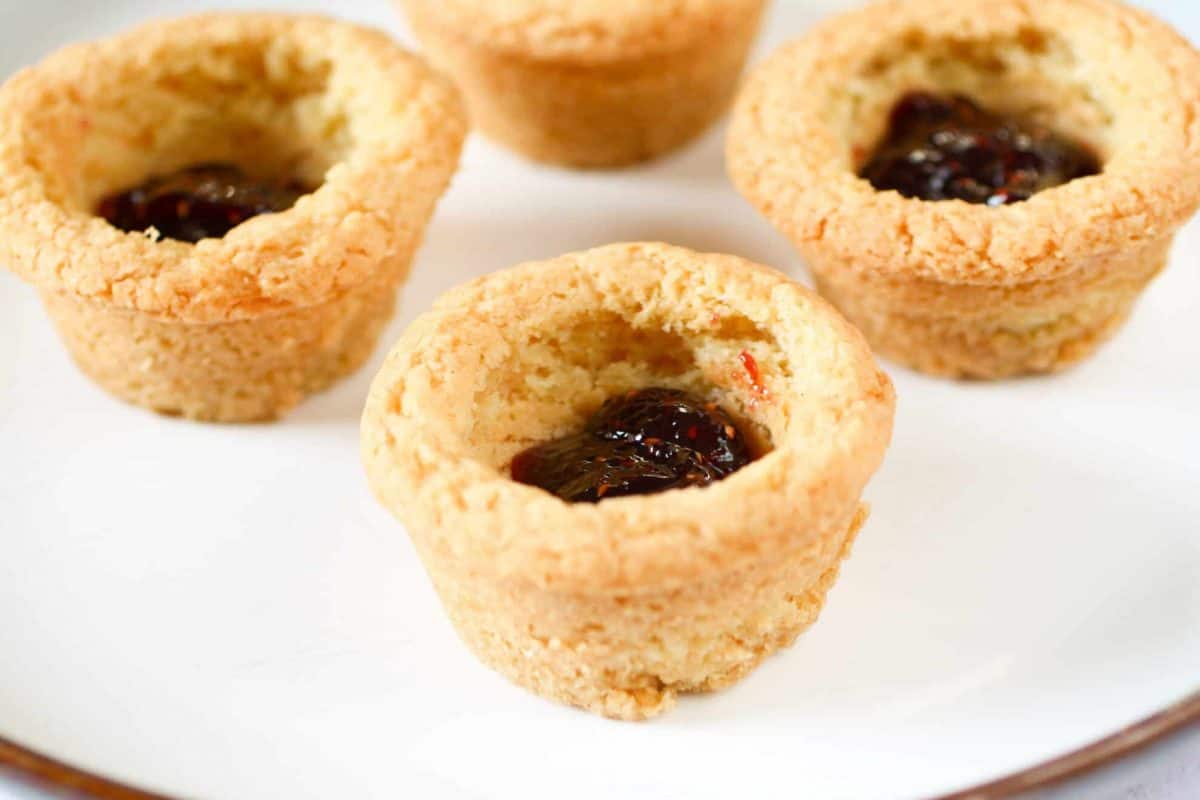 Sugar Cookie Cups filled with raspberry jam 