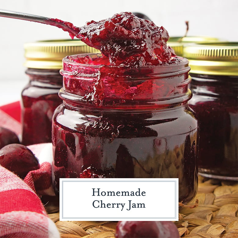 Homemade Cherry Jam being spooned out of a mason jar  