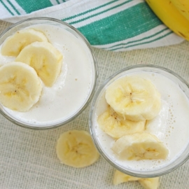 two banana smoothies in cups