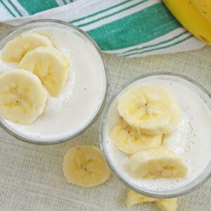 two banana smoothies in cups