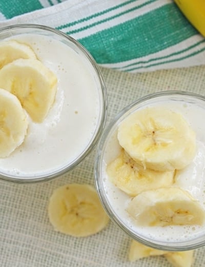 two banana smoothies in cups