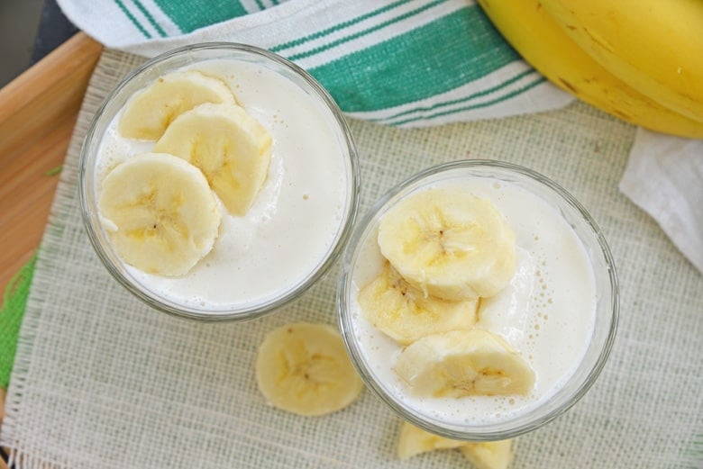 two banana smoothies in cups