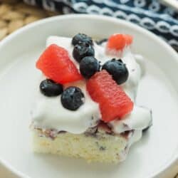 slice of blueberry watermelon poke cake