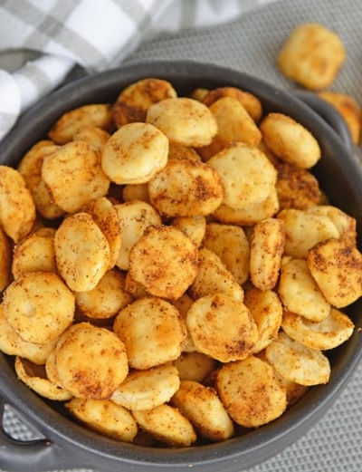 angled shot of bowl of Cajun Oyster Crackers