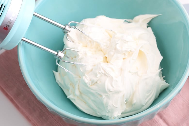 Fluffy vanilla frosting for poke cake 