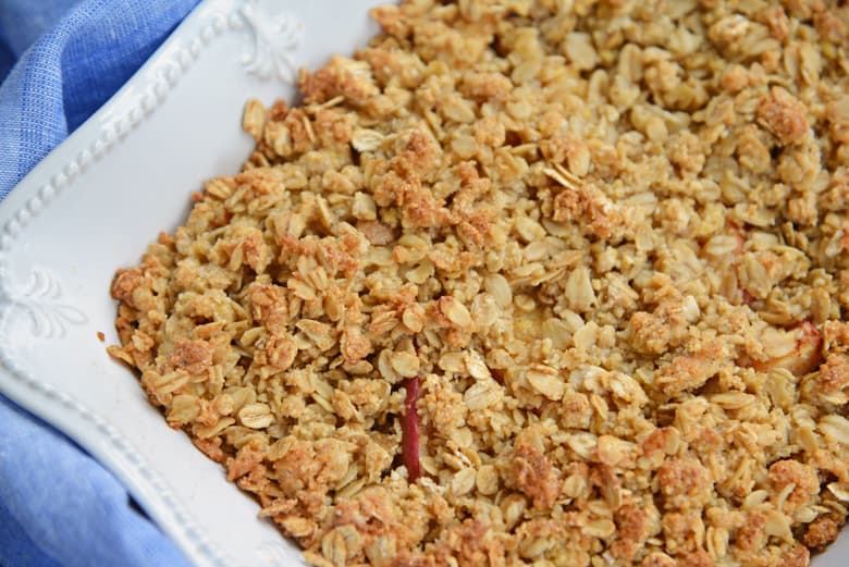 corner of an apple crisp in the baking dish 