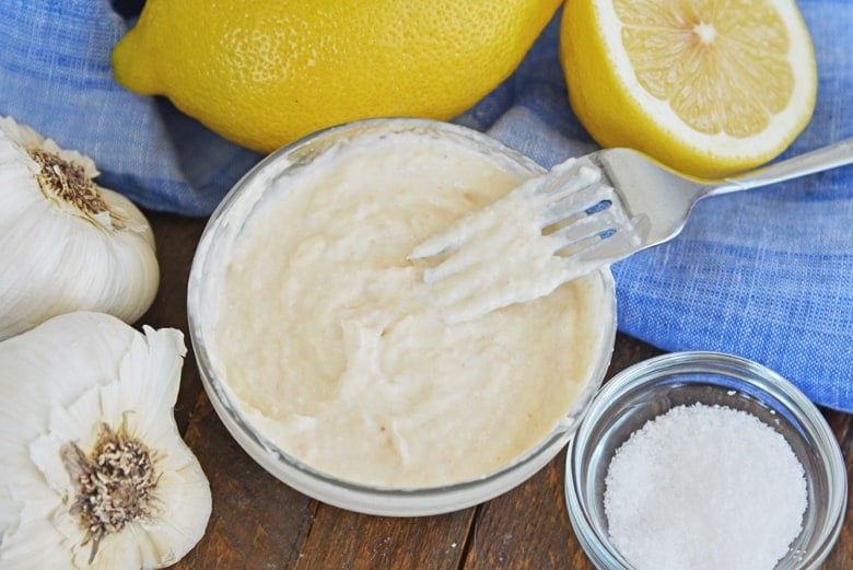 Zesty horseradish aioli sauce surrounded by ingredients 