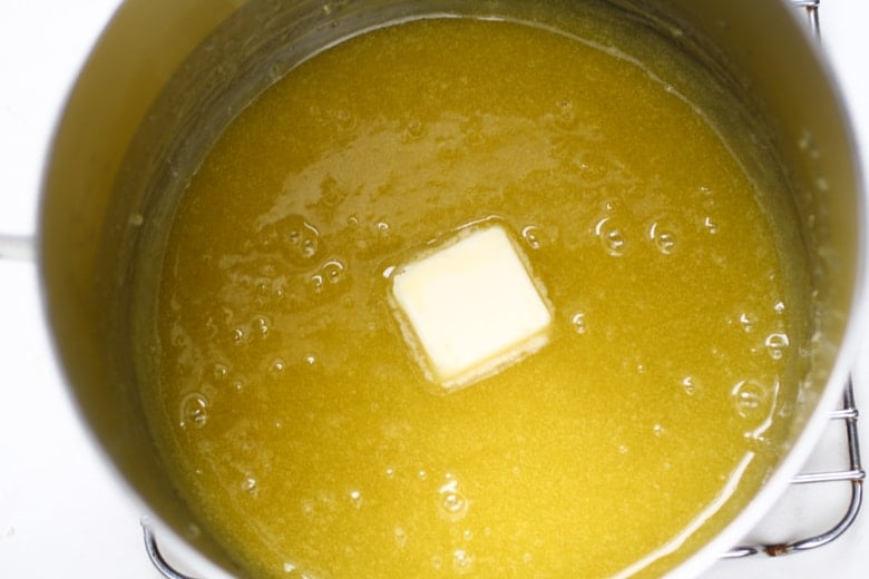lemon curd cooking in a saucepan 