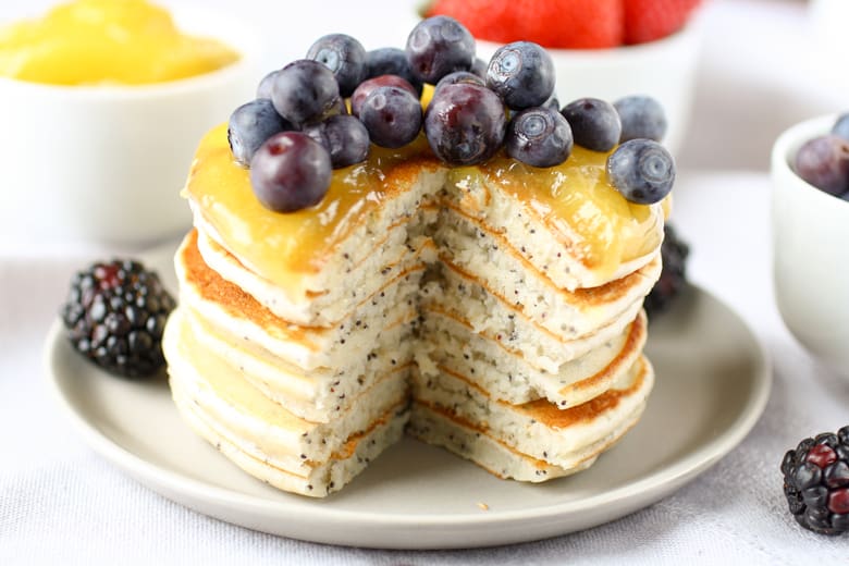 sliced homemade pancakes with blueberries and lemon 