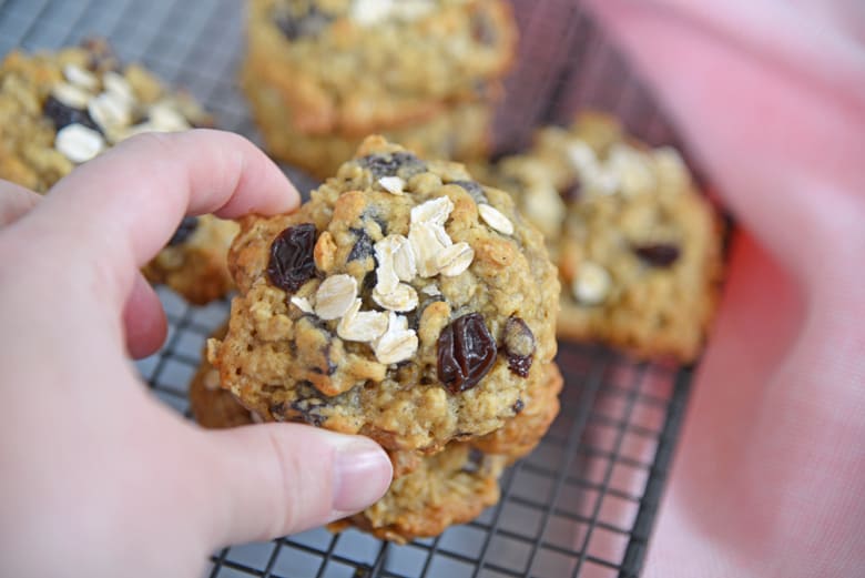 hand reaching in to grab a cookie