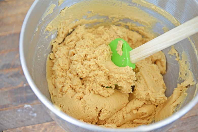 peanut butter cookie dough in a mixing bowl 