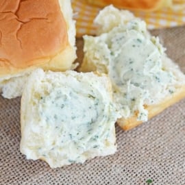 A close up of roll with butter