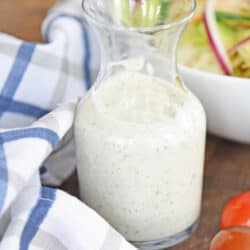close up of salad dressings in a glass jar