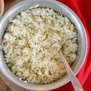 This EASY Ranch Rice recipe is a super versatile side dish that will add gentle flavor to any dinner you are serving. A great way to use a pantry staple! #ranchrice #ricerecipes #ranchricerecipe #easyricerecipes www.savoryexperiments.com