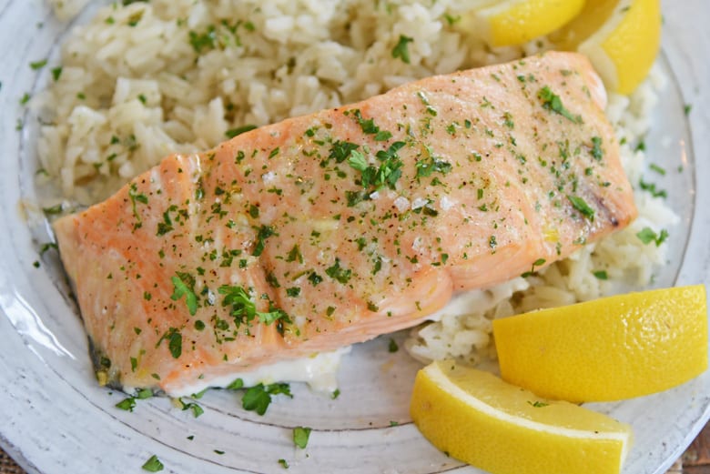 A plate of salmon with rice