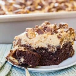 slice of peanut butter cup poke cake